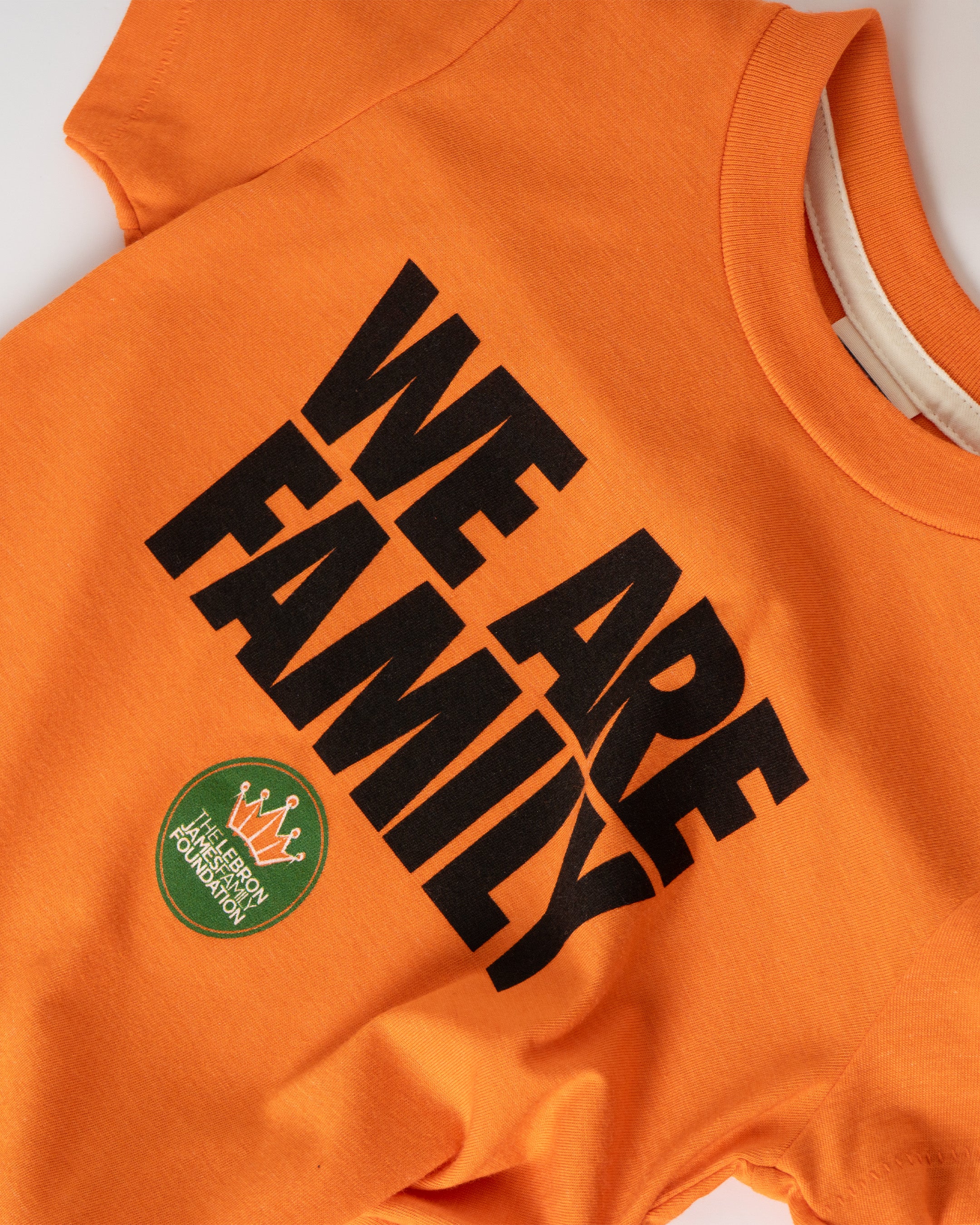 2025-WeAreFamily-kids-orange_tee_3.jpg