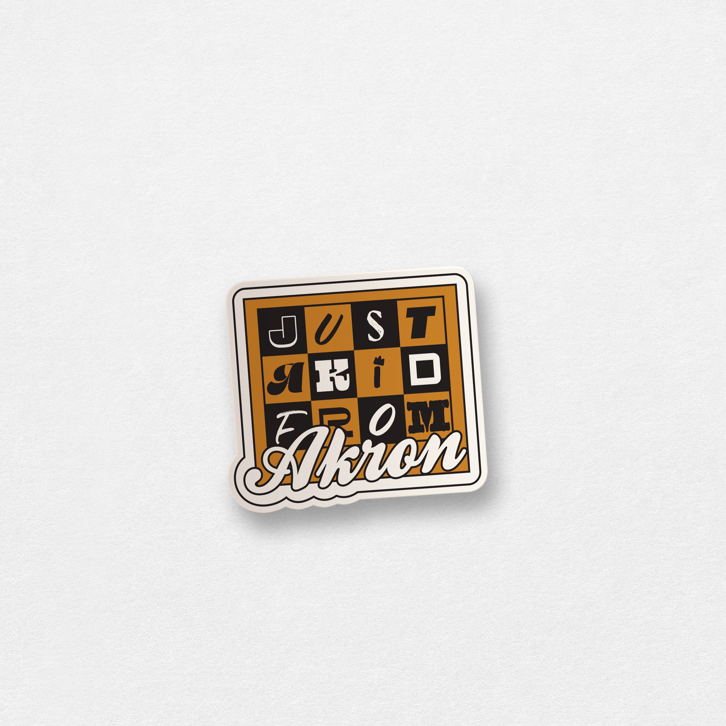 JUST_A_KID_FROM_AKRON_BLACK_GOLD_STICKER_1x1_697db9b8-5887-47ce-aec8-2644e9ae8fbd.jpg